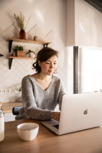 Woman completing an online contact form.