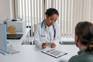 photo of healthcare worker and patient