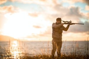 hunter near a lake